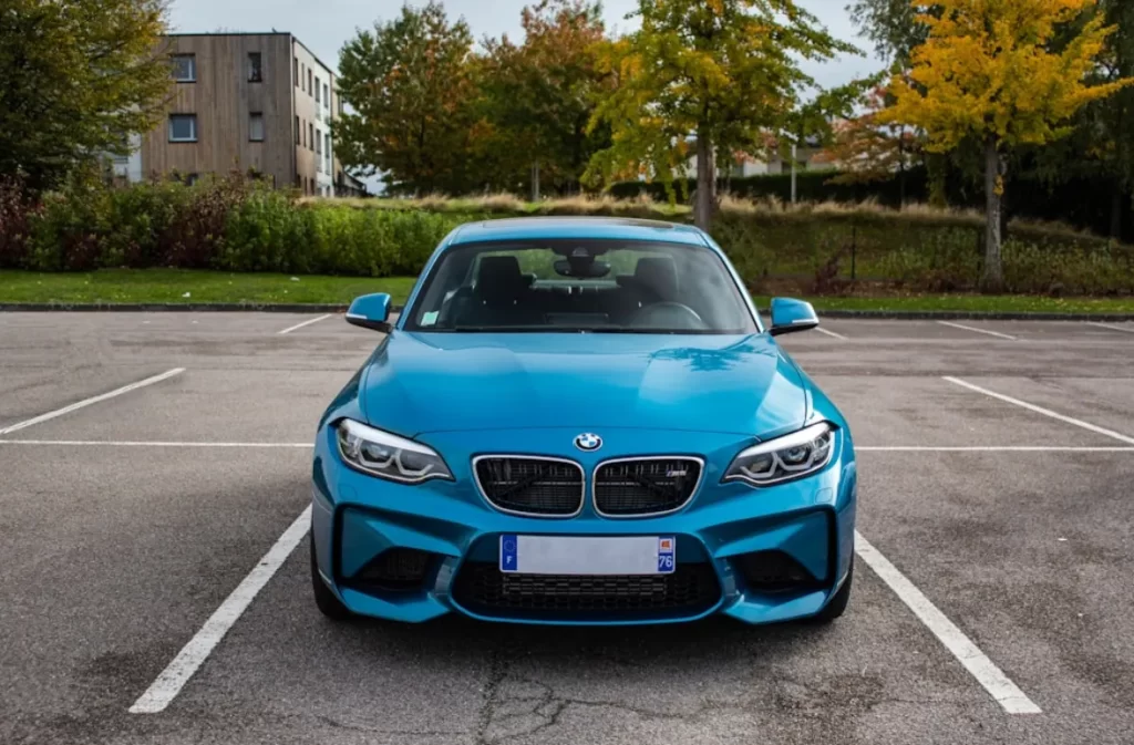 BMW performance car in a parking lot.